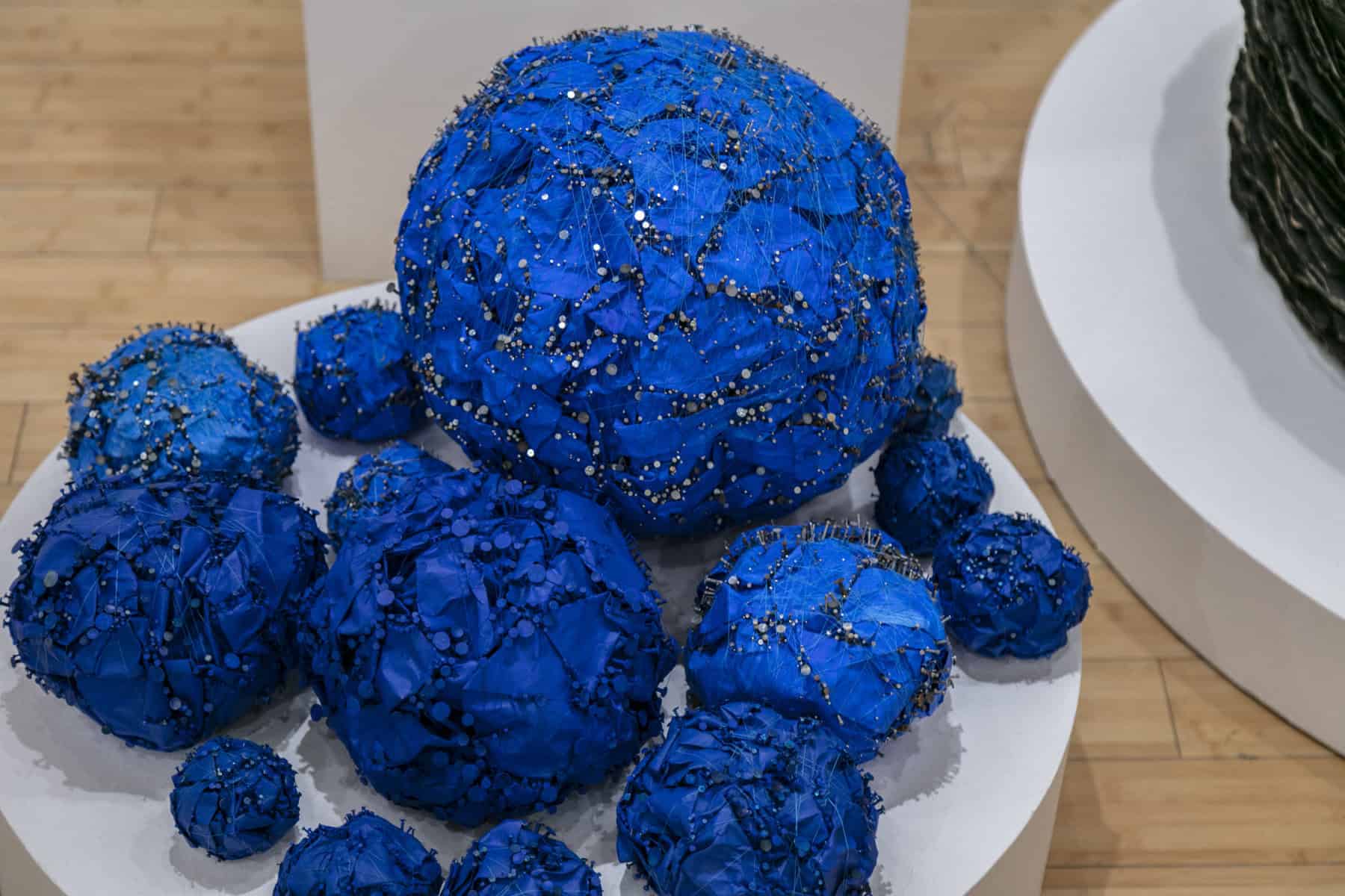 Echiko Ohira, Globes #3 (detail), 2019. Paper, acrylic, thread, nail, pins, Courtesy of the artist.