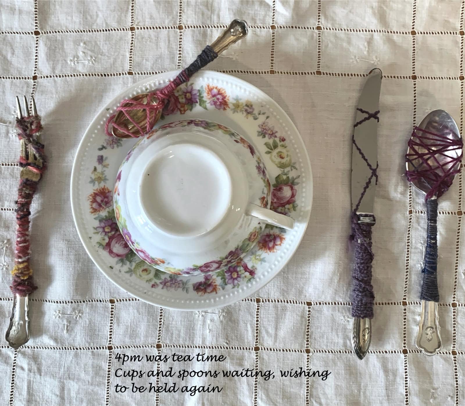 Teatime – Porcelain tea cup from my mother’s collection and silver place setting brought over from Germany in 1937.